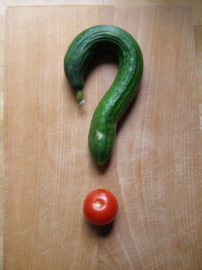 Cucumber and tomato in shape of question mark