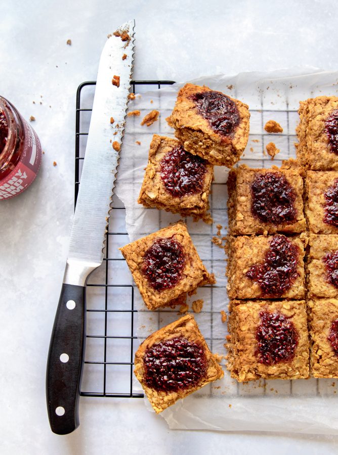 Baked Peanut Butter & Jam Oat Bars from hot for food all day: easy recipes to level up your vegan meals